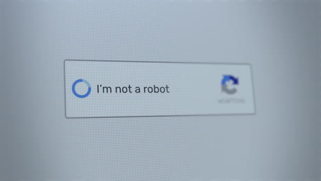 Mouse-clicking-on-I'm-not-a-robot-button-on-a-computer-screen-confirming-that-the-user-is-human